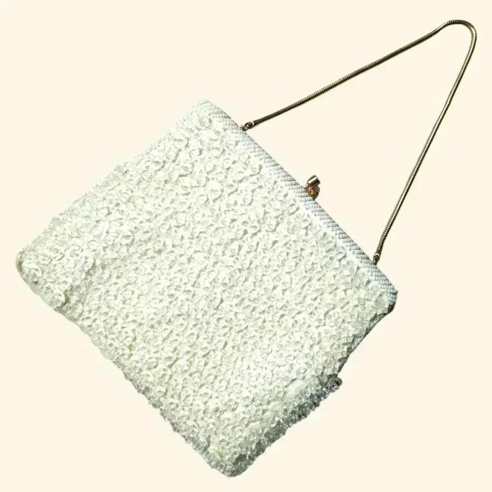 Elegant White Clutch with Gold Chain